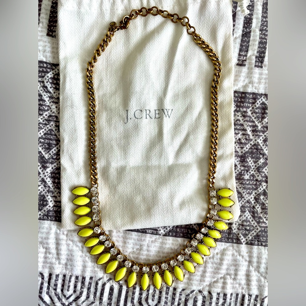 J Crew chunky gold necklace with neon yellow and diamond pendants.